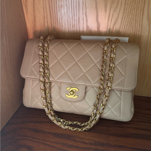 CHANEL Handbags - Chanel Beige Quilted CC Flap Bag